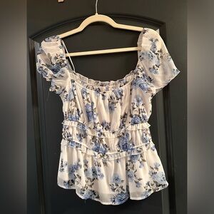 NWT Francesca’s white and blue floral top
